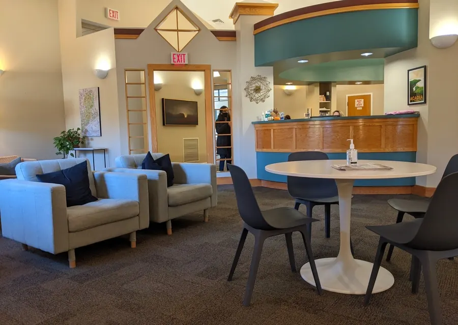 The reception desk and waiting area at Falmouth Dental Health.